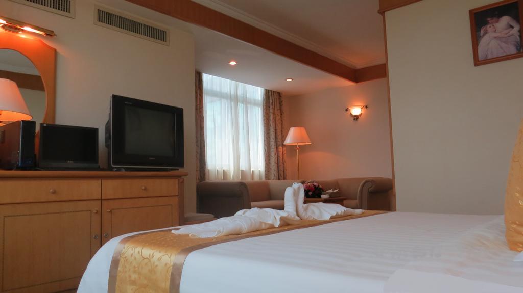 Hotel Guoxi San-ja Pokoj fotografie