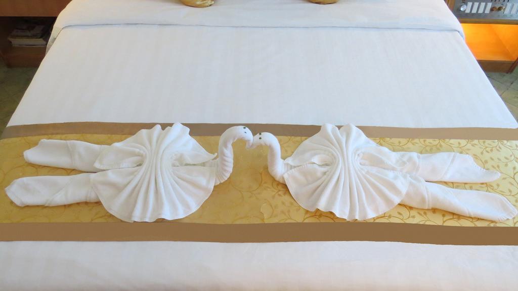 Hotel Guoxi San-ja Pokoj fotografie
