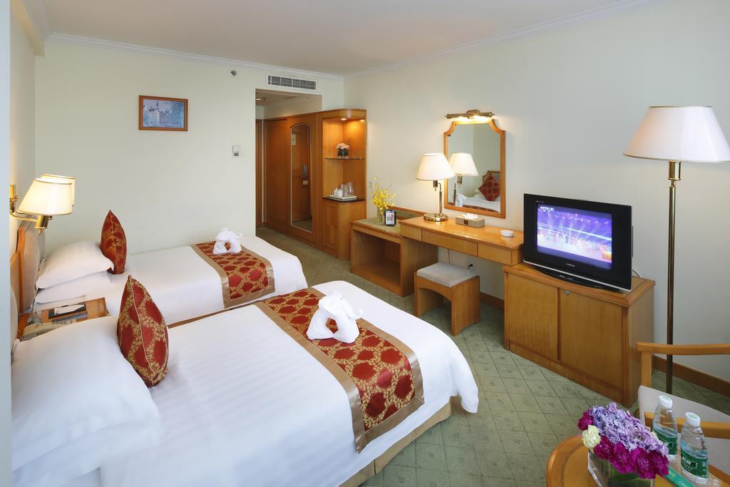Hotel Guoxi San-ja Pokoj fotografie
