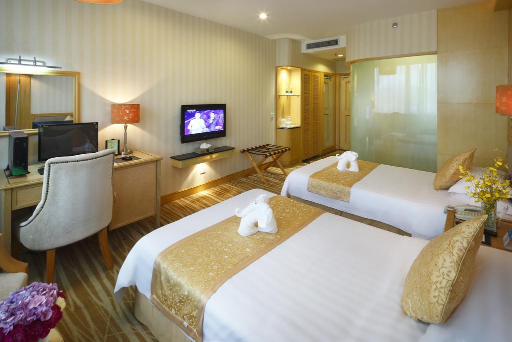 Hotel Guoxi San-ja Pokoj fotografie