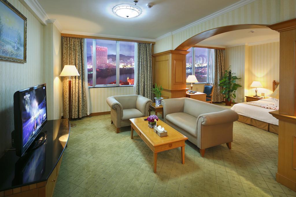 Hotel Guoxi San-ja Pokoj fotografie